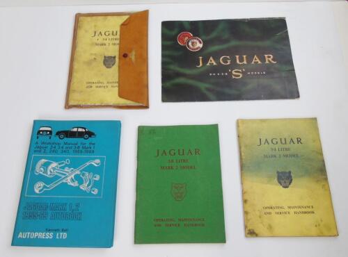 A small selection of Jaguar handbooks ...