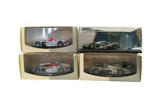 Four scale model cars ...